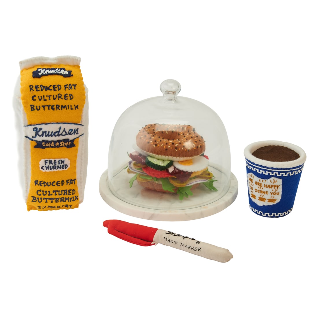 Lucy Sparrow, Collection of Hand-Stitch Felt: Lucy Sparrow (English, born 1986), Collection of hand-stitched stuffed felt, paint pen, and mixed media, including (i) Everything Bagel Sandwich, 2024, signed underneath, is housed in a glass dome