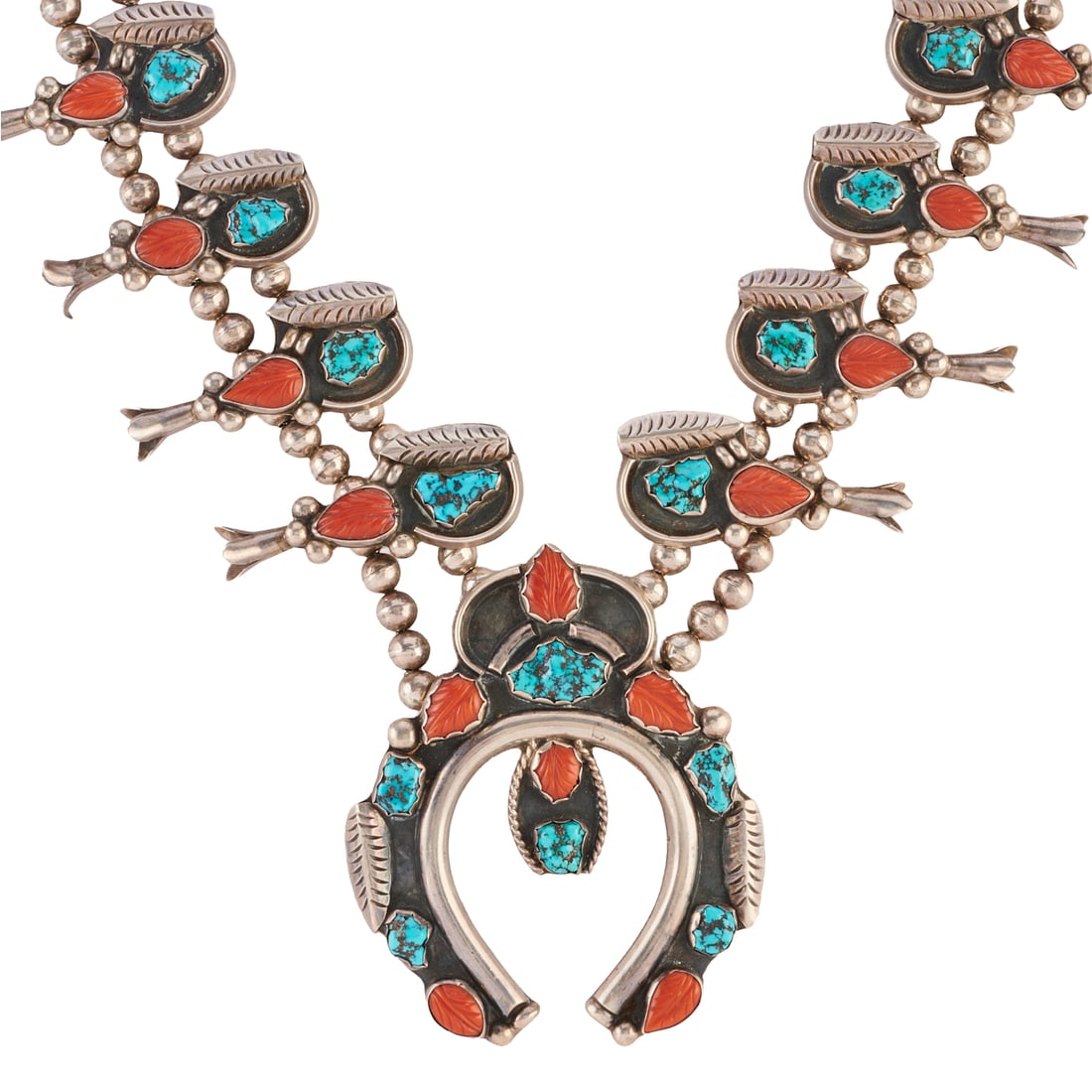 *Native American Navajo Leroy Benally Turquoise, Coral, Silver Squash Blossom Necklace: *Native American Navajo Leroy Benally Turquoise, Coral, Silver Squash Blossom Necklace. Featuring one central carved coral, turquoise, silver naja measuring approximately 97 x 80 mm, accented by