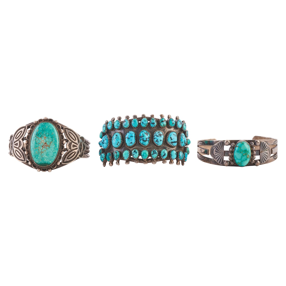 Collection of Three Native American Turquoise, Silver Cuff Bracelets: Collection of Three Native American Turquoise, Silver Cuff Bracelets. Including one turquoise cabochon, silver cuff bracelet measuring approximately 36 mm in width and with an internal diameter of