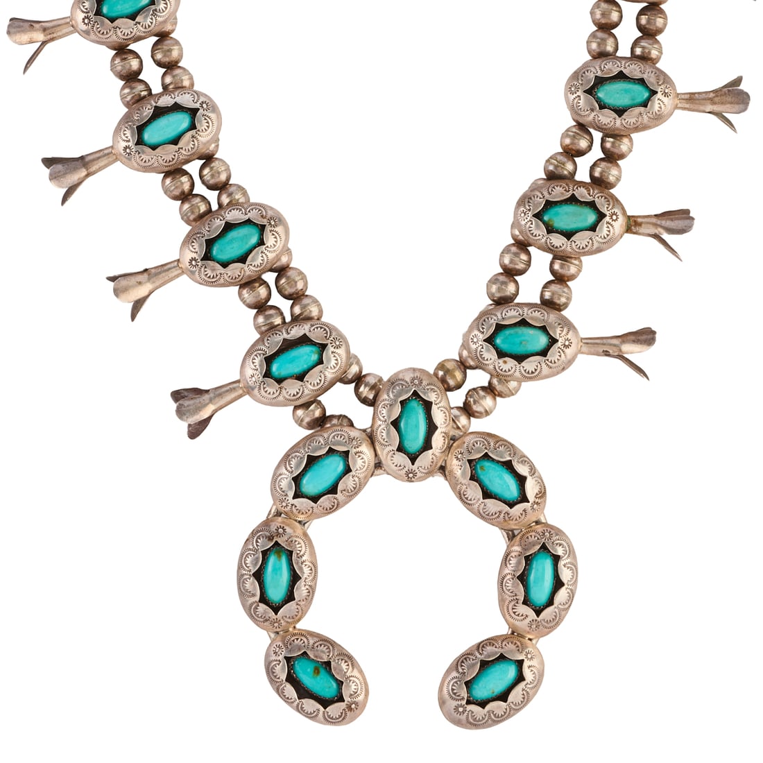 Native American Turquoise, Silver Shadow Box Squash Blossom Necklace: Native American Turquoise, Silver Shadow Box Squash Blossom Necklace. Centering one oval shaped turquoise cabochon, silver shadow box naja measuring approximately 87 x 82 mm, accented by twelve