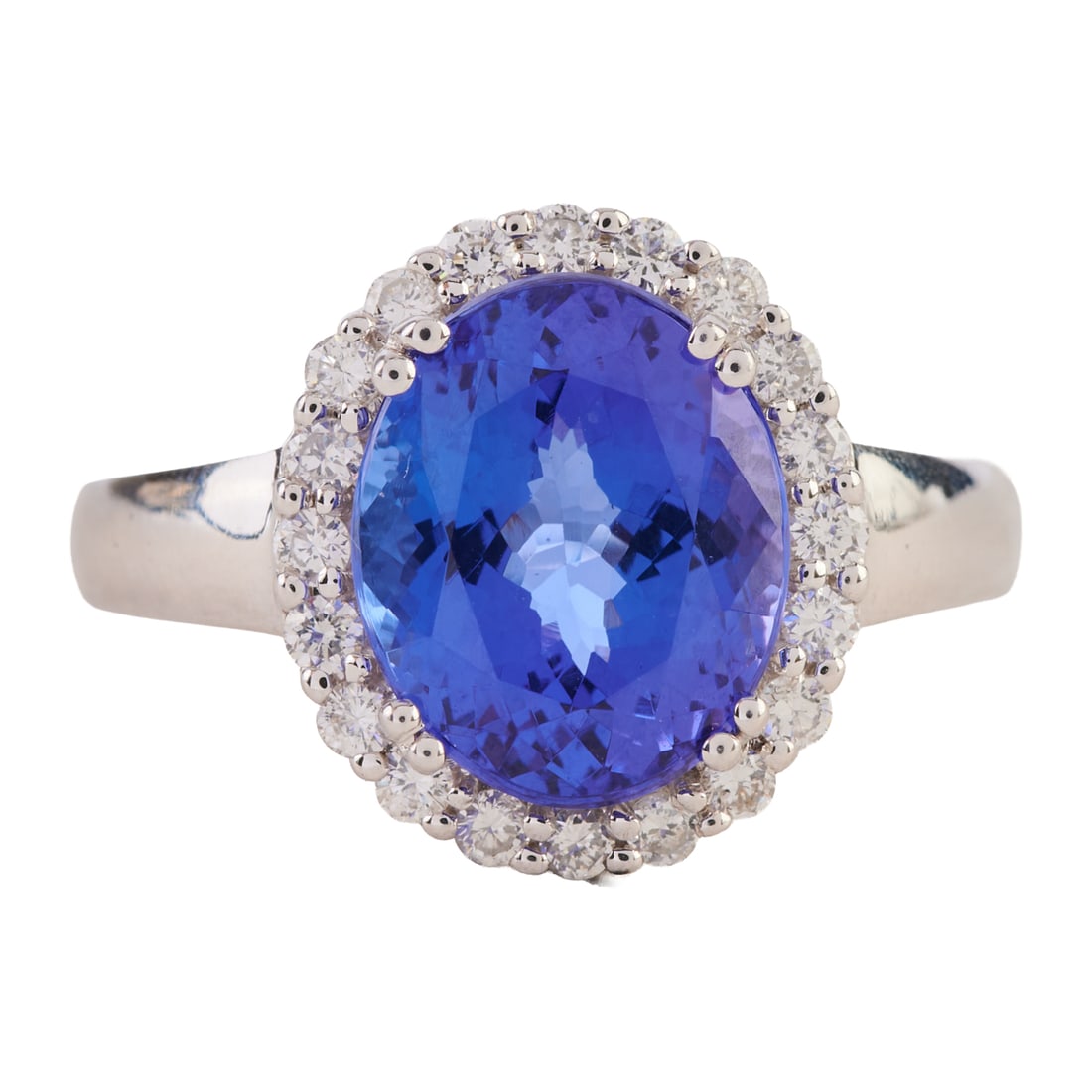 Iliana Tanzanite, Diamond, 18k White Gold Ring: Iliana Tanzanite, Diamond, 18k White Gold Ring. Featuring one oval-cut tanzanite weighing approximately 4.55 cts., accented by twenty full-cut diamonds weighing a total of approximately 0.70 cttw., se