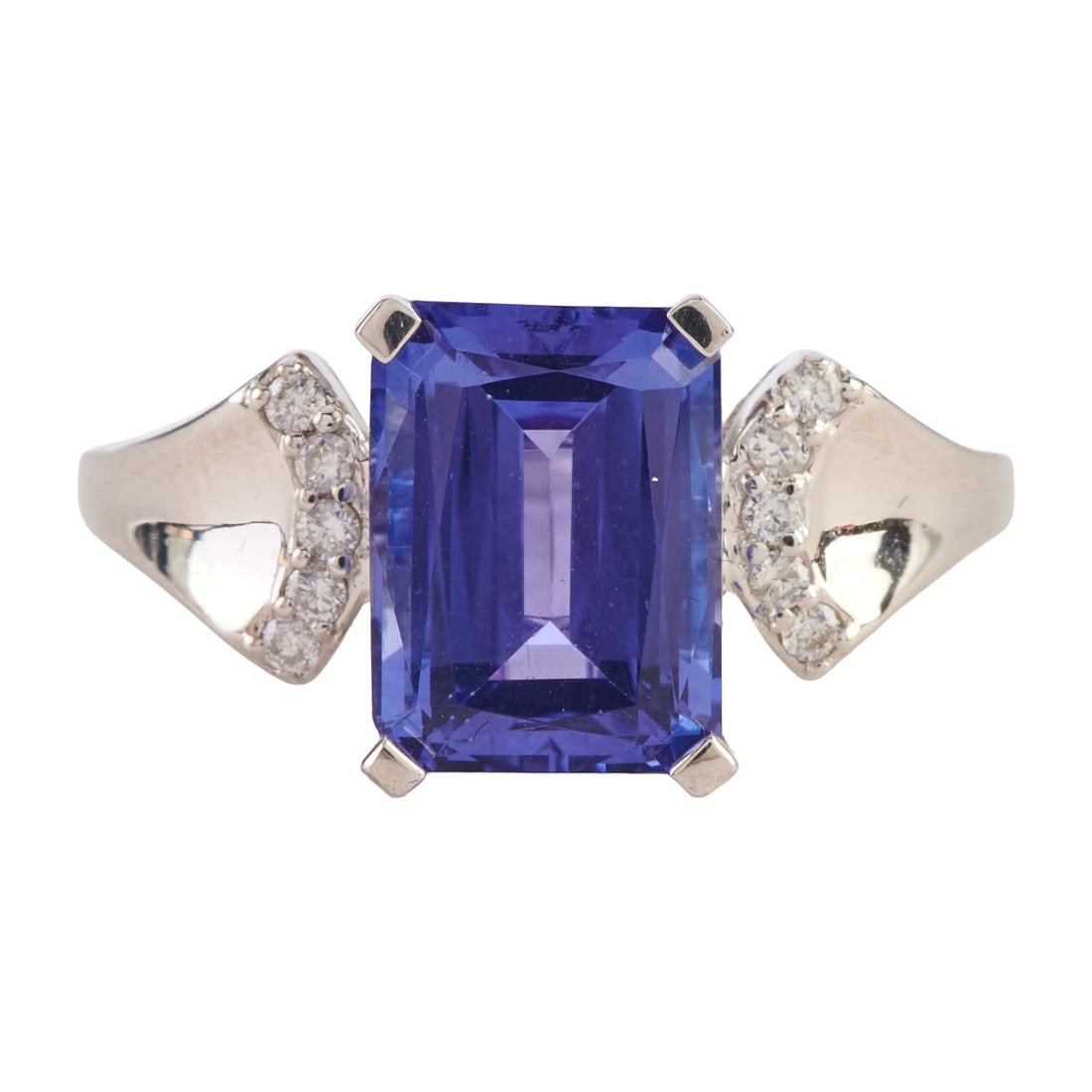 Tanzanite, Diamond, 14k White Gold Ring: Tanzanite, Diamond, 14k White Gold Ring. Featuring one emerald-cut tanzanite weighing approximately 3.79 cts., accented by ten full-cut diamonds weighing a total of approximately 0.10 cttw., set in a 