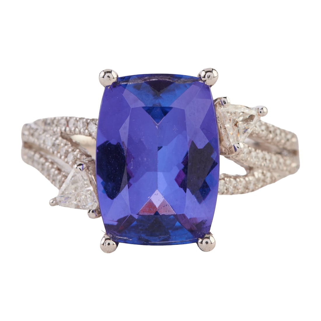 Tanzanite, Diamond, 14k White Gold Ring: Tanzanite, Diamond, 14k White Gold Ring. Featuring one cushion-cut tanzanite weighing approximately 3.70 cts., flanked by two triangular-cut diamonds, accented by full-cut diamonds, set in a 14k white