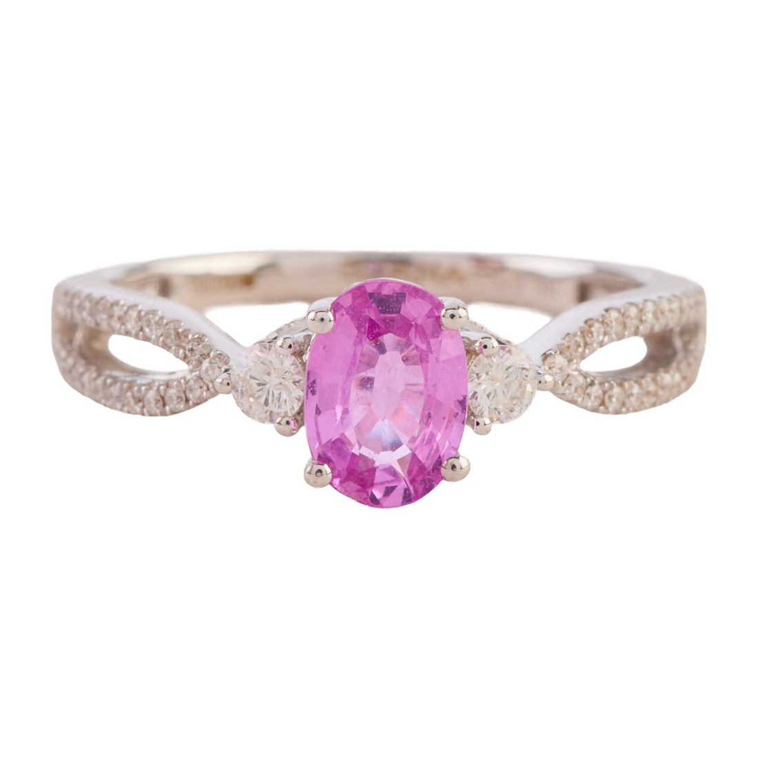 Iliana Pink Sapphire, Diamond, White Gold Ring: Iliana Pink Sapphire, Diamond, White Gold Ring. Featuring one oval-cut pink sapphire weighing approximately 0.70 ct., accented by forty-eight full-cut diamonds weighing a total of approximately 0.25 c