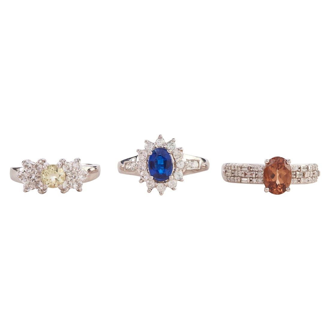 Collection of Three Multi-Stone, White Gold Rings: Collection of Three Multi-Stone, White Gold Rings. Including one idocrase, diamond, 14k white gold ring, size 7; one green quartz, colorless topaz, 14k white gold ring, size 6 3/4 together with one sy
