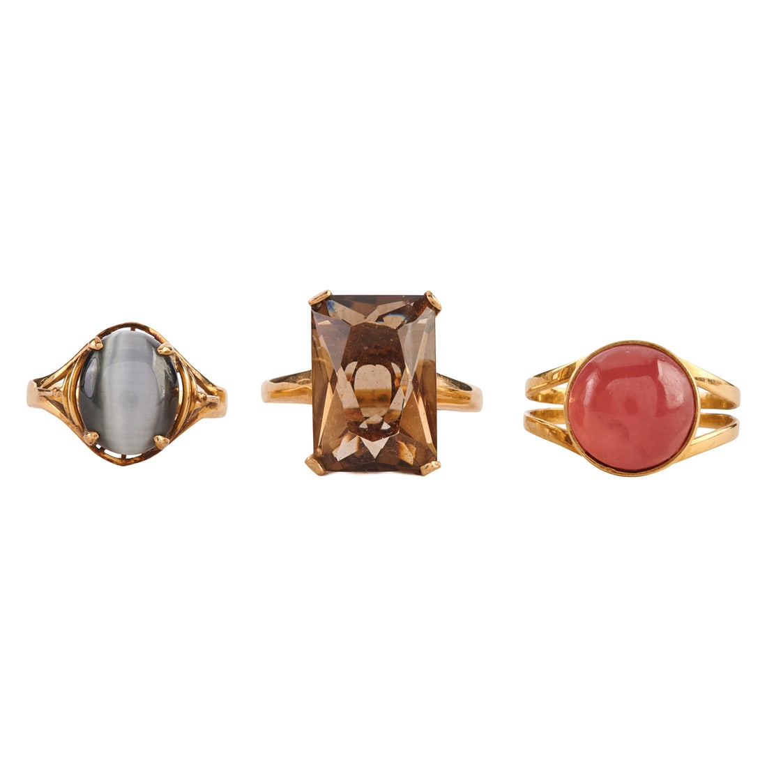 Collection of Three Multi-Stone, Yellow Gold Rings: Collection of Three Multi-Stone, Yellow Gold Rings. Including one round carnelian cabochon, 18k yellow gold ring, size 5; one cat's eye, 14k yellow gold ring, size 4 3/4 together with one smoky quartz