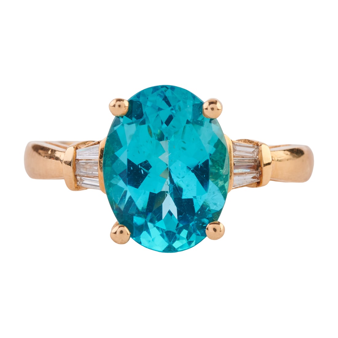 Apatite, Diamond, 14k Yellow Gold Ring: Apatite, Diamond, 14k Yellow Gold Ring. Featuring one oval-cut apatite weighing approximately 3.20 cts., flanked by six tapered baguette-cut diamonds weighing a total of approximately 0.10 cttw., set 