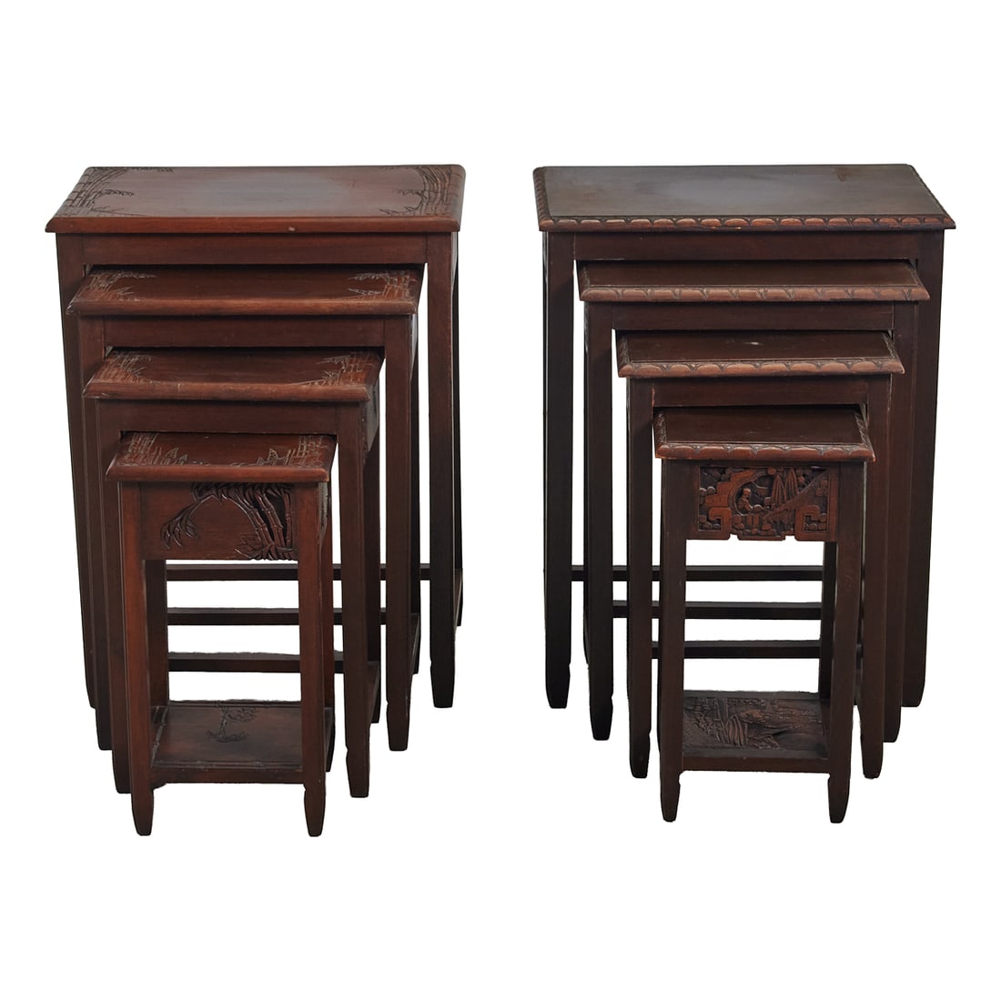 Two Sets of Four Chinese Carved Wood Nesting Tables: Two Sets of Four Chinese Carved Wood Nesting Tables. Each graduated set comprising four rectangular tables, carved with landscape, bamboo, and floral motifs. Eight pieces total. {Sizes range from H 25