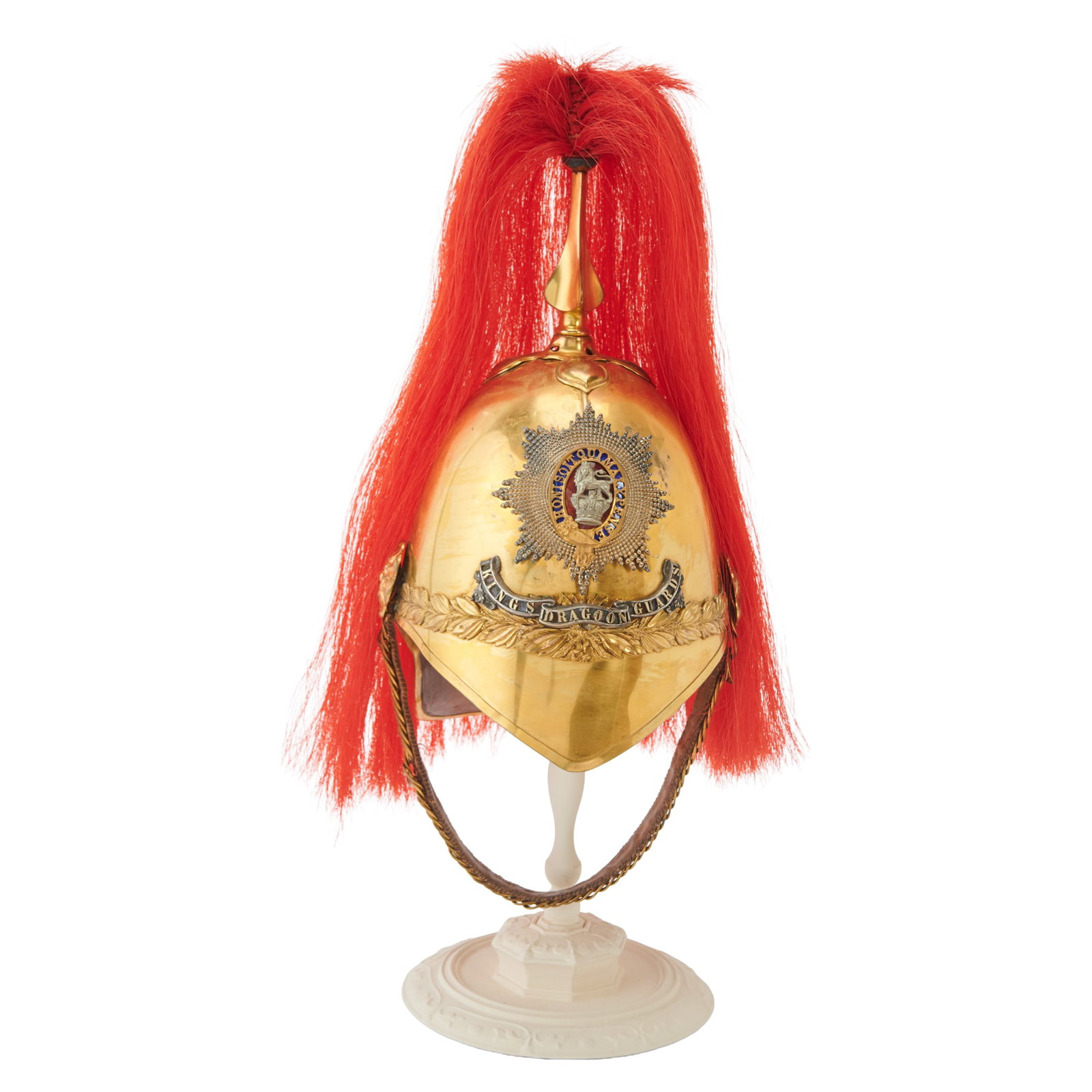 British Army First Kings Dragoon Guards Full Dress Helmet: British Army Kings Dragoon Guards Full Dress Helmet, Albert Pattern Officers helmet, the gilt brass skull with quatre-lobed low relief foliate decoration below the plume holder, above