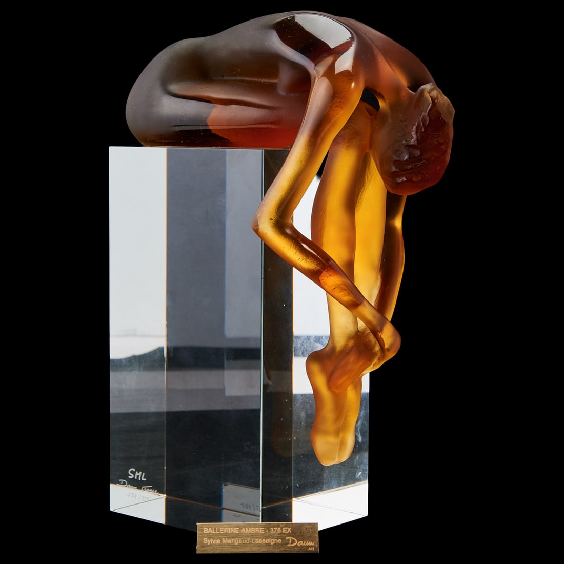 Daum Pate de Verre Crystal Sculpture, Ballerine, by Mangau Lasseigne: Daum Pate de Verre Crystal Sculpture, Ballerine, by Mangau Lasseigne, modelled as the cast amber figure of the slumping ballerina, on a clear crystal, rectangular base. Engraved "SML / Daum,
