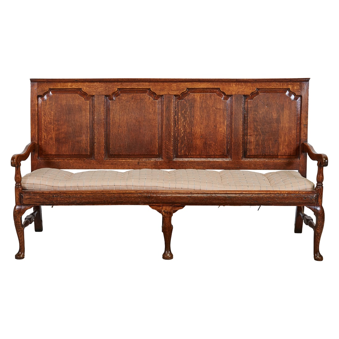 Georgian Style Oak High Back Settle: Georgian Style Oak High Back Settle, the four seat high back above lightly carved arms, over five cabriole legs, with turned stretchers between front and back side legs.;Later woven seat base and