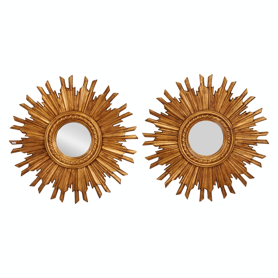 Pair of Italian Wood Carved and Gilt Sunburst Mirrors: Pair of Italian Wood Carved and Gilt Sunburst Mirrors.{Approximate dimensions - each: 35 1/4" Diameter x 3" D.}.
