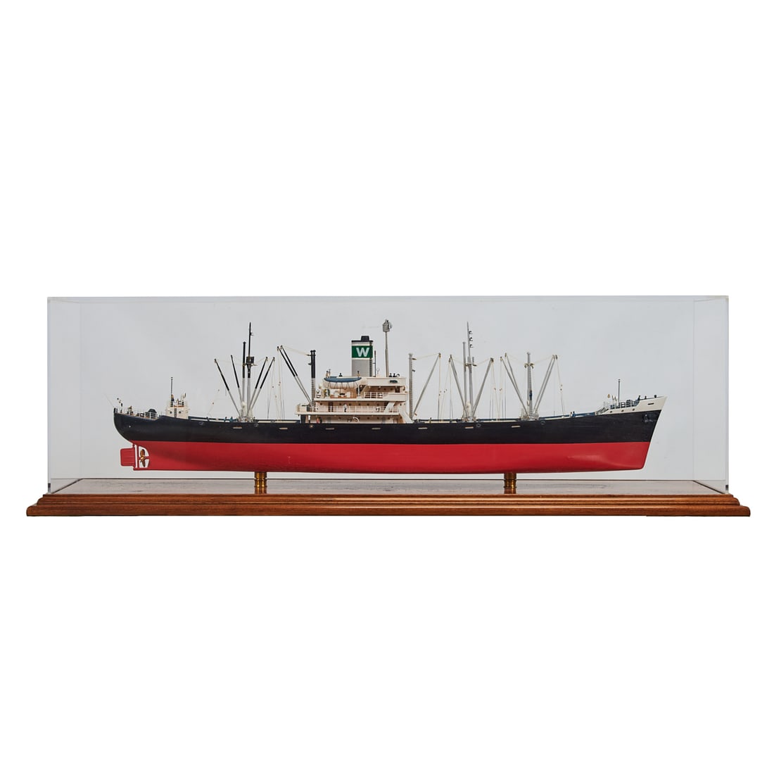 Merchant Ship Model of a Single Crew Cargo Ship: Merchant Ship Model of a Single Crew Cargo Ship, complete with masts, rigging, derricks, aerials, navigation;lights, and deck details, such as anchors, winch, cleats, bollards, deck railings, companio