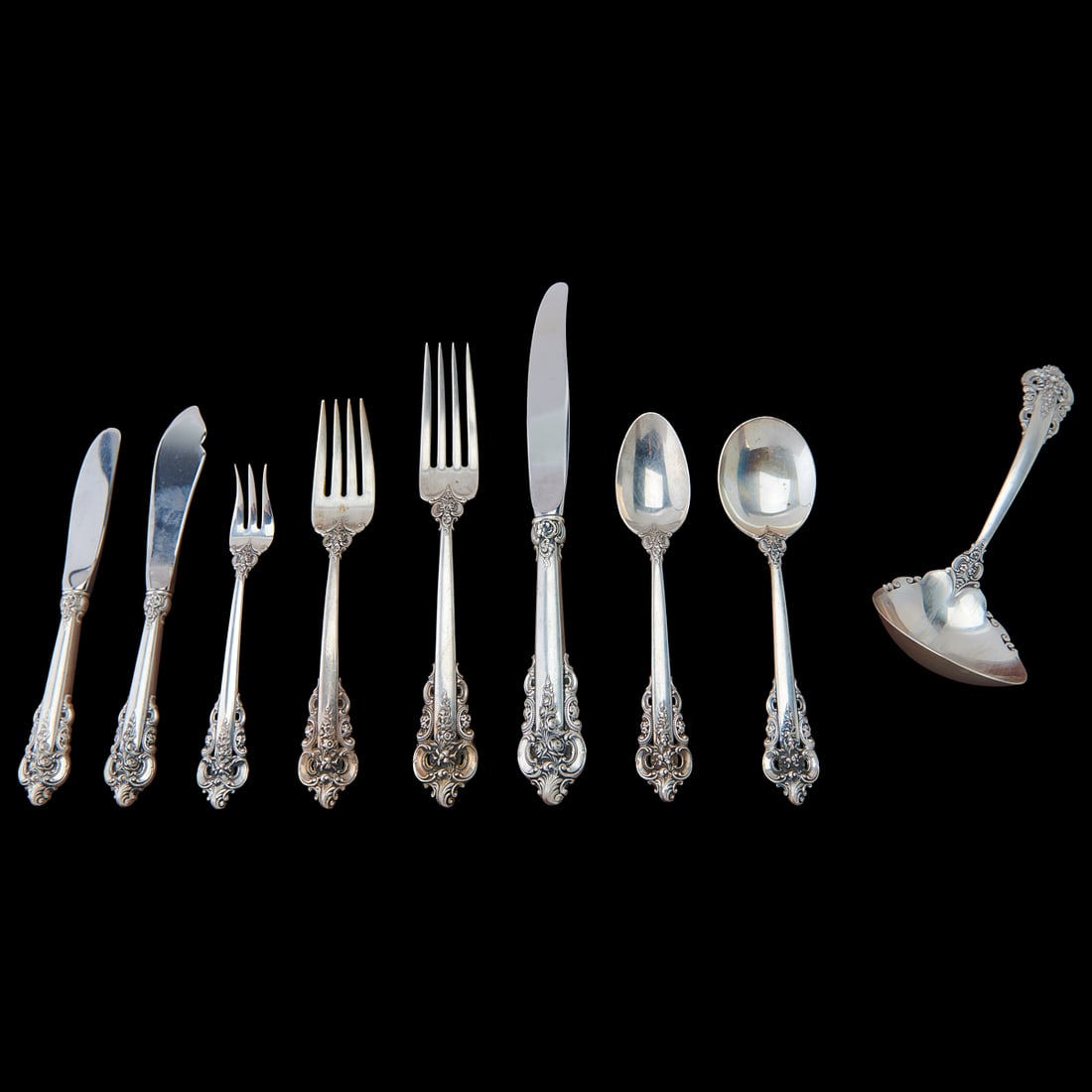 Wallace Grande Baroque Sterling Silver Flatware Service: Wallace Grande Baroque Sterling Silver Flatware Service, comprising 18 dinner forks, 7" L., 16 dinner knives, 9" L., 19 luncheon or salad forks, 6 1/4" L., 11 bouillon soup spoons, 6 3/16" L., 17 teas