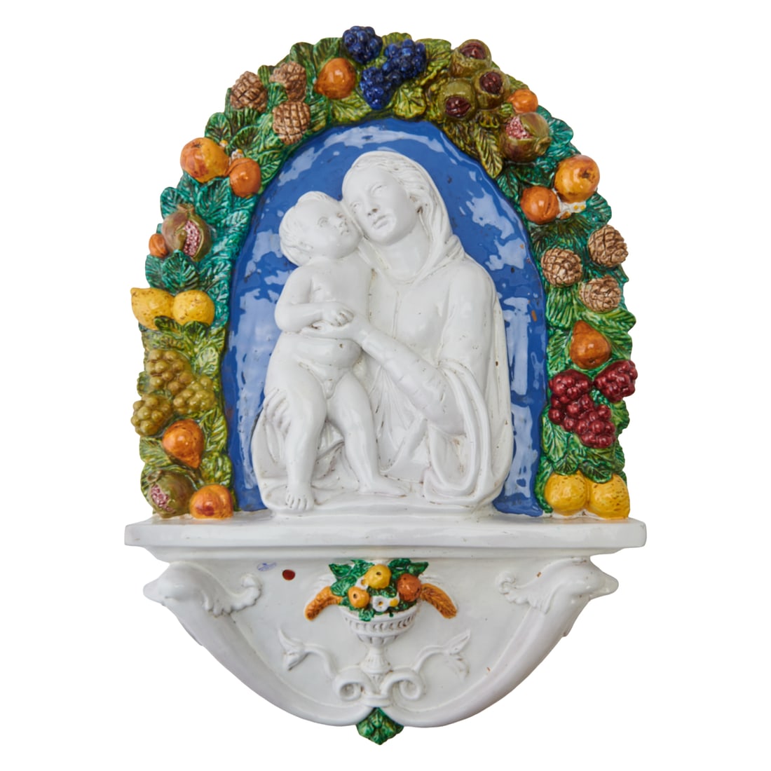 Italian Majolica Madonna and Child Wall Plaque Style of Della Robbia: Italian Majolica Madonna and Child Wall Plaque Style of Della Robbia, the arched surround with fthe white figures of the Mother and Infant on a blue ground, surrounded by fruit and foliage in high