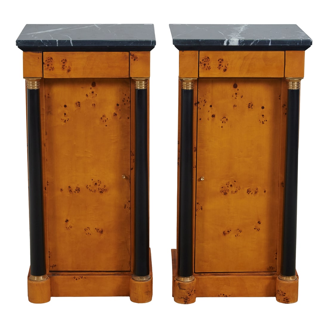 Pair of Empire Style Parcel Ebonized Nightstands with Marble Tops: Pair of Empire Style Parcel Ebonized Nightstands with Marble Tops, the tops overcast above blind drawers, with ebonized columns to either side of blind doors.;{Approximate dimensions: 31 1/2" H. x 15 