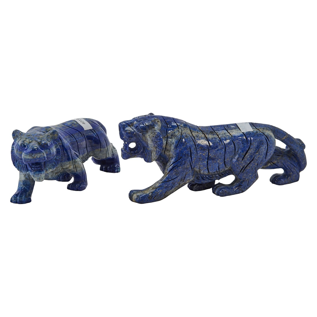Pair of Lapis Lazuli Tiger Figures: Pair of Lapis Lazuli Tiger Figures, the male and female modelled en statent, growling, with tails down, he with larger mane than female.;{Approximate dimensions:; 3 1/2" H.x 7 7/8" W. x 1 3/4" D.