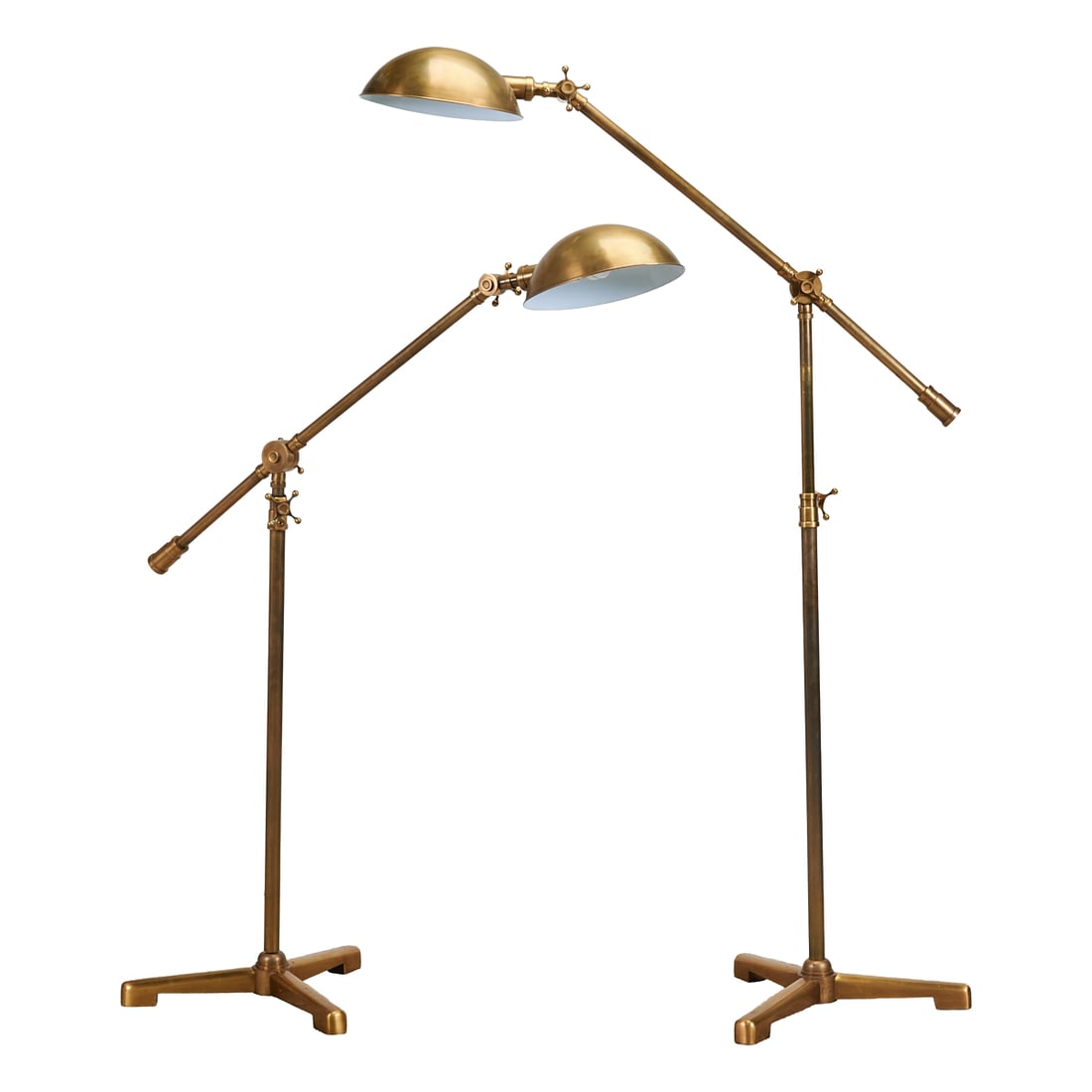 Pair of Brass Telescopic Cantilever Floor Lamps: Pair of Brass Telescopic Cantilever Floor Lamps, on tripodal bases, with faucet handles to adjust heights.;{Approximate dimensions about as pictured:; More extended example, 73" high x 50 1/2" deep