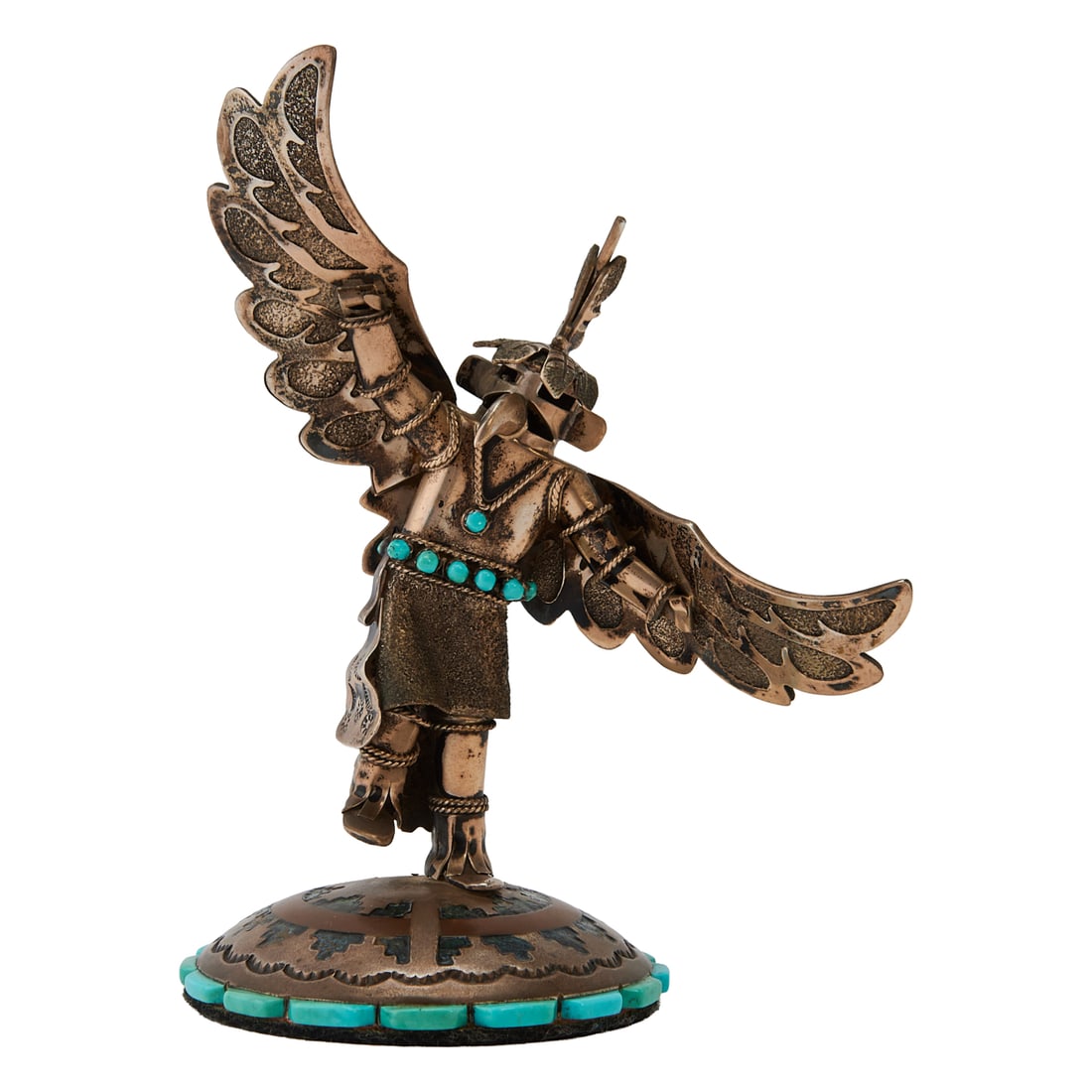Wilford Begay Sterling Silver Kachina with Turquoise: Wilford Begay Sterling Silver Kachina with Turquoise, copper decoration to base, the figure designed as a bird katsinam. Makers mark impressed to back of head, over STERLING / NAVAJO. Accompanied by