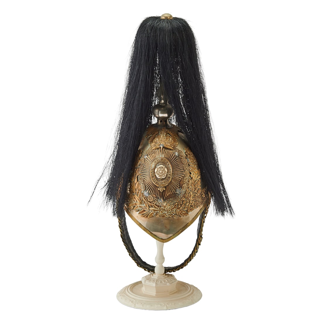 British Cavalry Officer Helmet: British Cavalry Officers Dragoon Helmet, the polished chromium metal and brass shell with tall finial fitted with a black horsehair plume, the helmet bade with crown over rayed band, surrounded a belt