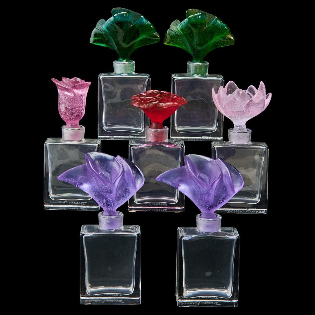 Seven Daum Crystal Scent Bottles: Seven Daum Crystal Scent Bottles, each with colored foliate or floral stopper: two gingko leaves, two lilac color flowers, "Sweet Garden" design, a pink "Rose passion," in frosted glass, a pale rose