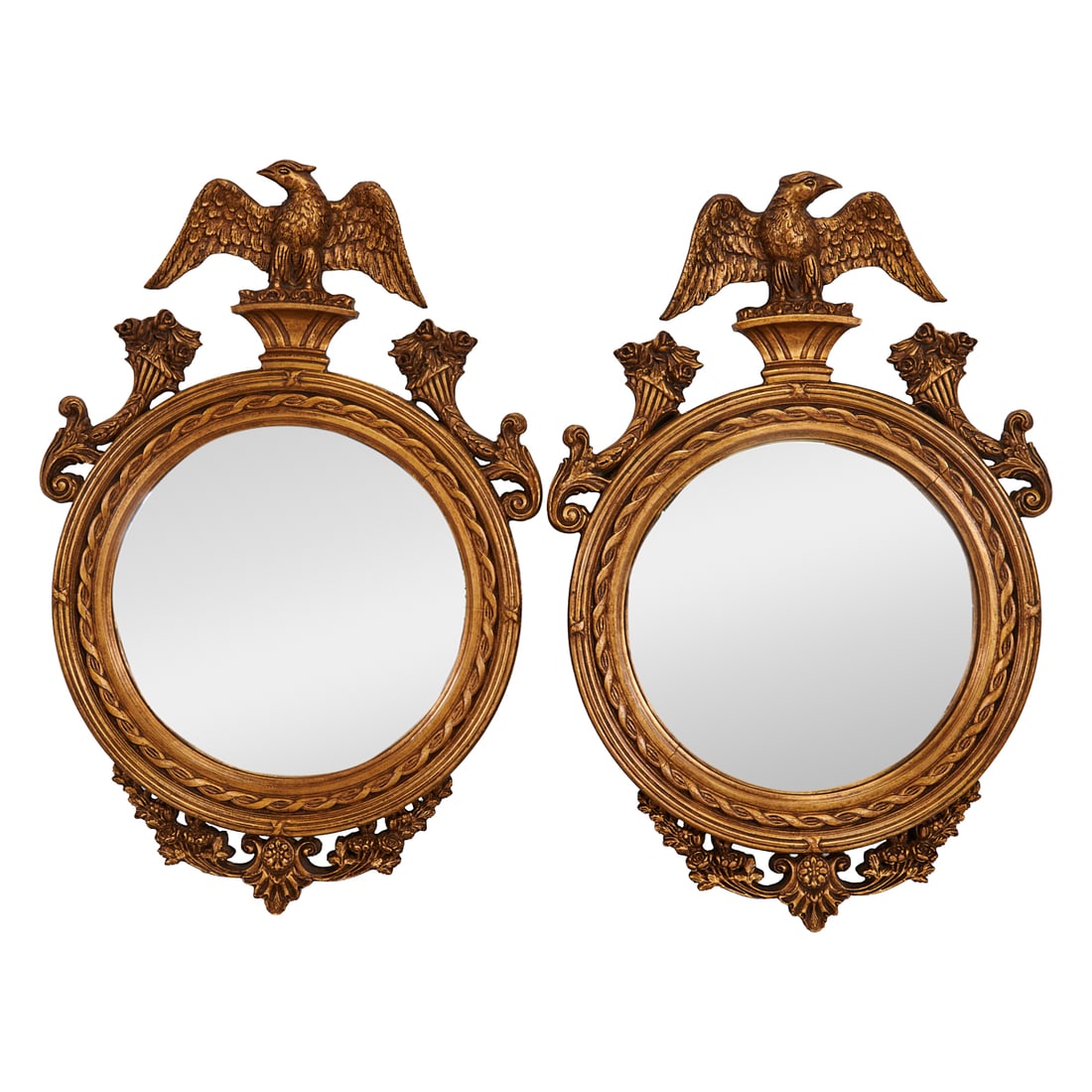 Pair of English Regency Style Wood Carved and Gilt Mirrors with Eagles: Pair of English Regency Style Wood Carved and Gilt Mirrors with Eagles.{Approximate dimensions - each:; 41" H. x 27 3/4" W. x 5" D.}.