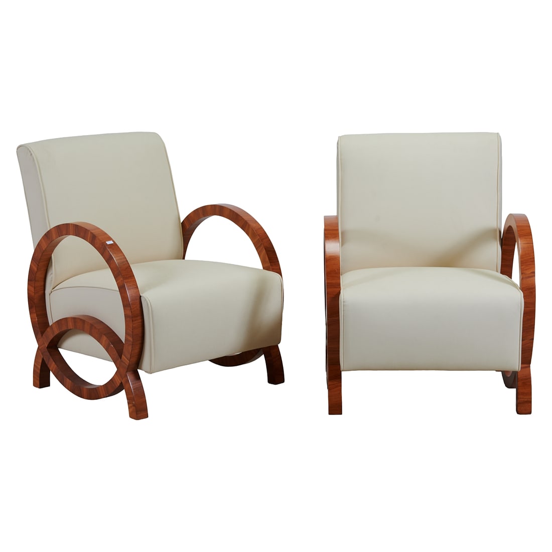 Pair of Art Deco Style Armchairs with Cream Upholstery: Pair of Art Deco Style Armchairs with Cream Upholstery, the frames with voided circular sides bisected by lower semi circles, with straight backs and seats. Upholstered in cream colored