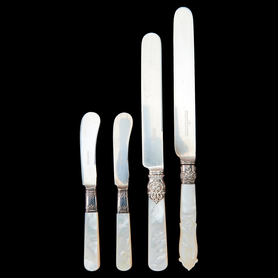 Thirty Six Mother of Pearl Handle Knives including with Sterling Mounts: Thirty Six Mother of Pearl Handle Knives including with Sterling Mounts, comprising 12 Harrison Brothers and Howson, "Cutlers to Her Majesty," with silverplate;guards, 12 Harrison, Fisher and Co., wit