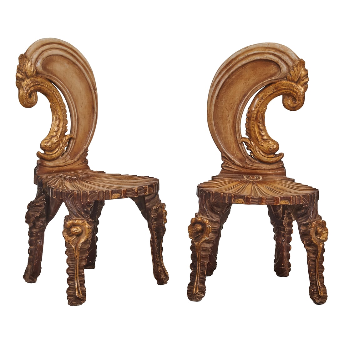 Pair of Grotto Style Low Side Chairs: Pair of Grotto Style Low Side Chairs, designed with dramatic curling scrolls to seat backs, en façent,;over seats carved with grooves, over faux rootstock legs, partial gilt.;{Approximate dimen