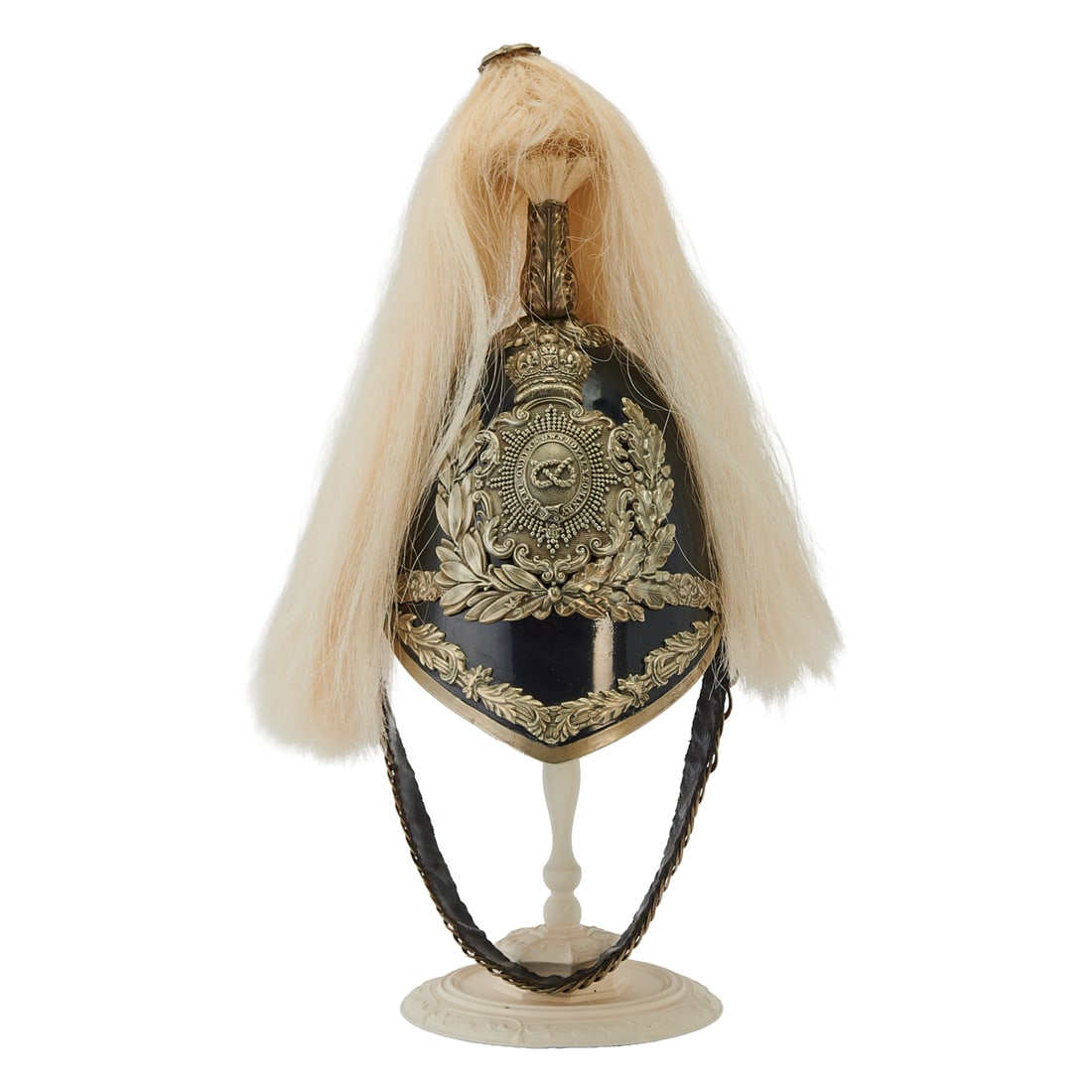 British Cavalry Officer Helmet: British Cavalry Officers Helmet, black enamel with silver metal fittings, the helmet plate with foliate wreath, and with leather chin chain connected to the sides with rosette bosses. White horsehair