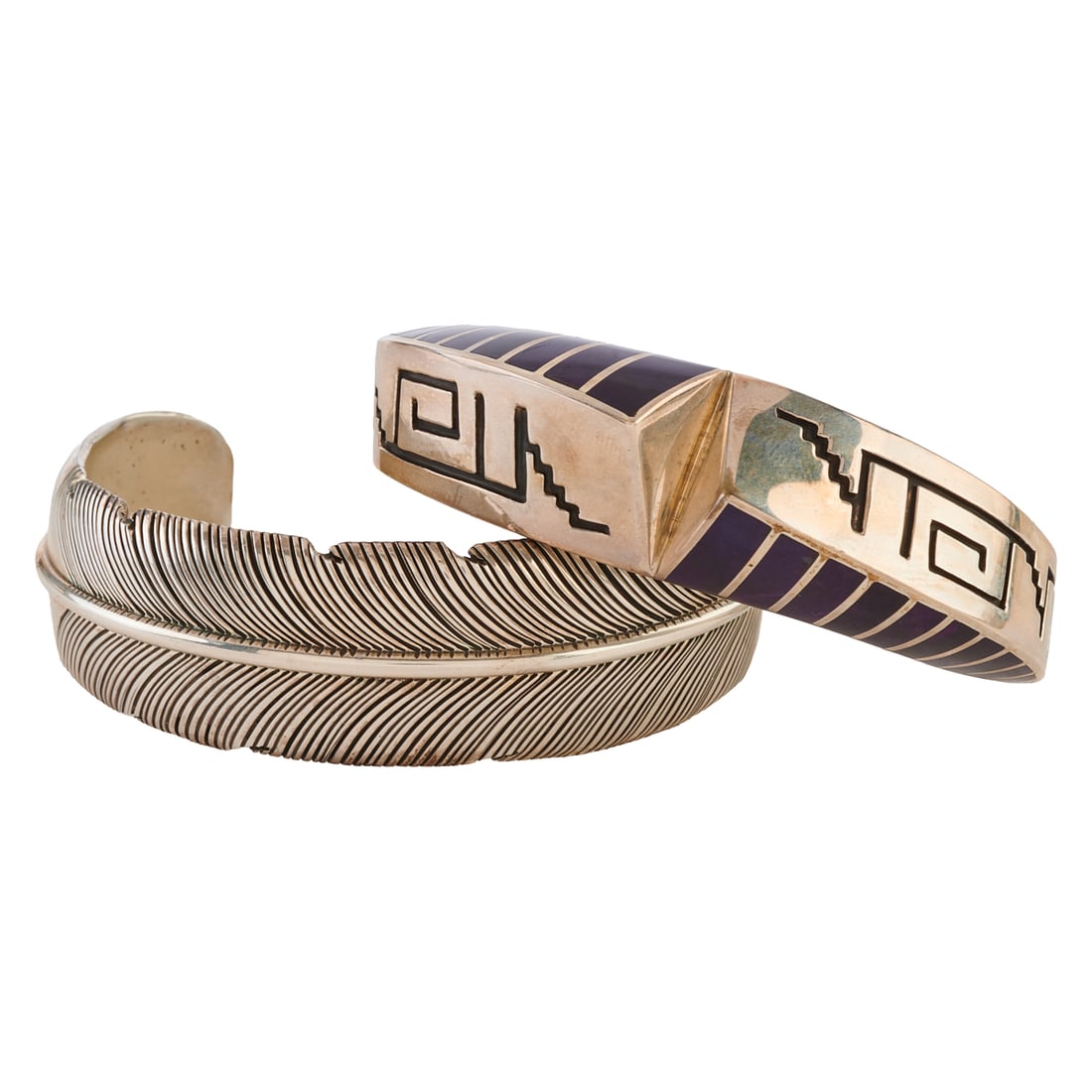 Two Native American Sugilite, Silver Cuff Bracelets: Two Native American Sugilite, Silver Cuff Bracelets. Including one sugilite inlay, silver cuff bracelet measuring approximately 20 mm in width and with an internal diameter of approximately 62 mm