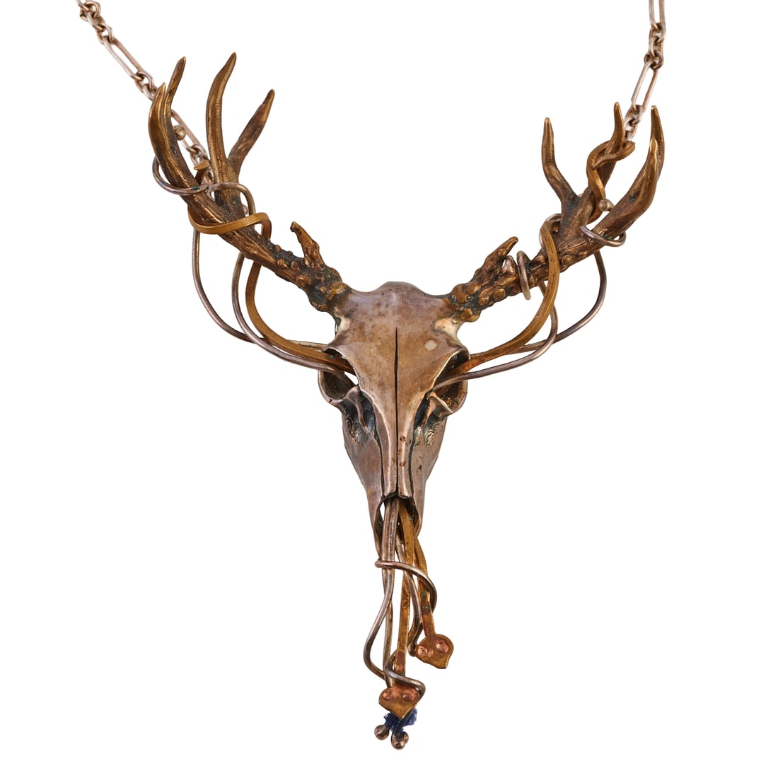 Silver, Bronze Elk Skull Necklace: Silver, Bronze Elk Skull Necklace. Designed as the skull and antlers of an elk made of silver and bronze and measuring approximately 4 x 2 3/4 inches, suspended from a silver chain, forming a 23 inch