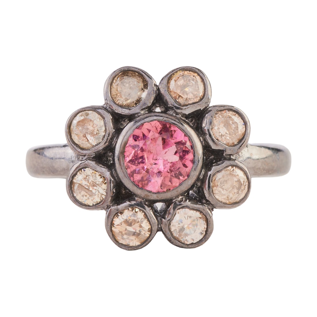 Pink Tourmaline, Diamond, Oxidized Silver Ring: Pink Tourmaline, Diamond, Oxidized Silver Ring. Centering one round-cut pink tourmaline measuring approximately 5 mm, surrounded by eight round-cut diamonds weighing a total of approximately 0.65