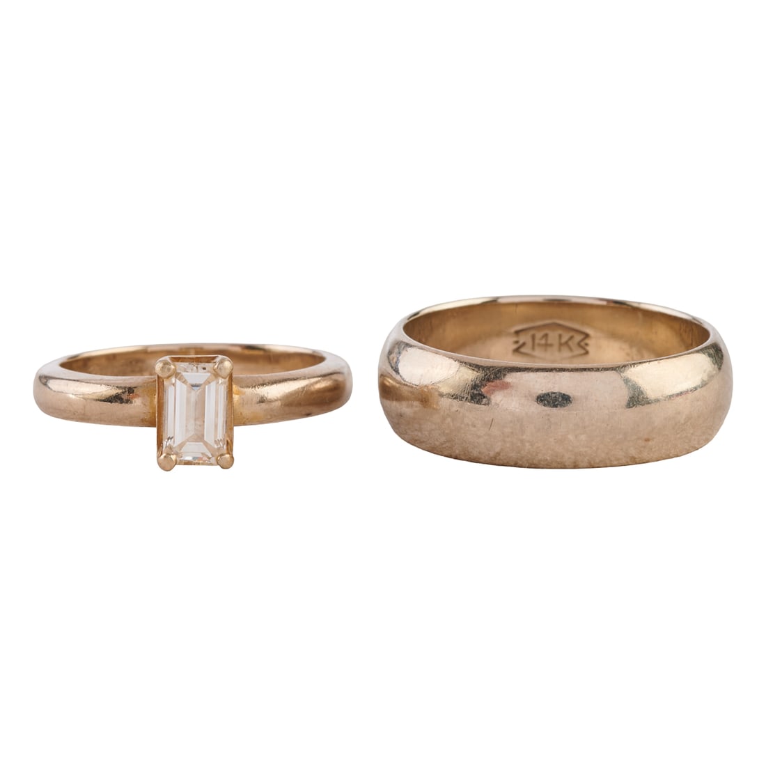 Collection of Two Diamond, 14k White Gold Rings: Collection of Two Diamond, 14k White Gold Rings. Including one emerald-cut diamond weighing approximately 0.40 ct., 14k white gold ring, size 5 1/2 together with one 14k white gold 6 mm band, size 8. 