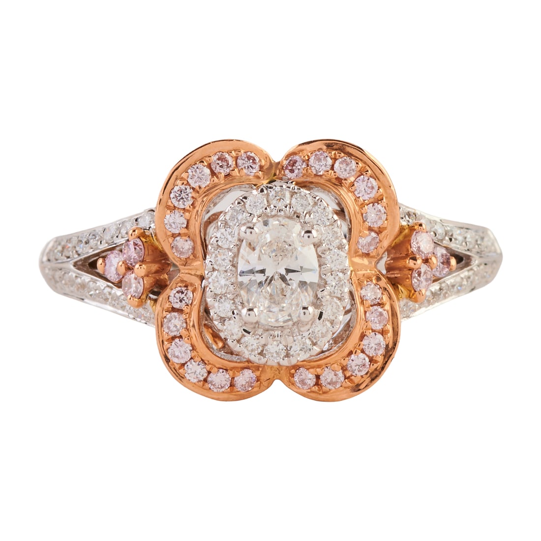 Diamond, 14k White and Rose Gold Ring: Diamond, 14k White and Rose Gold Ring. Centering one oval-cut diamond, accented by round-cut pink and near colorless diamonds weighing a total of approximately 1.00 cttw., set in a 14k white and rose 