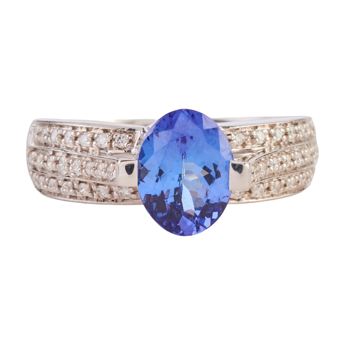 Tanzanite, Diamond, 14k White Gold Ring: Tanzanite, Diamond, 14k White Gold Ring. Featuring one oval-cut tanzanite weighing approximately 1.70 ct., accented by full-cut diamonds, set in a 14k white gold mounting. {Size: 7, Gross Weight: 3.5 