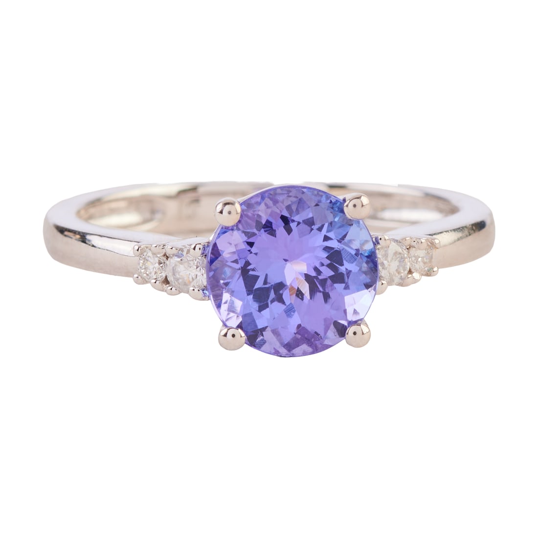 Tanzanite, Diamond, 14k White Gold Ring: Tanzanite, Diamond, 14k White Gold Ring. Featuring one round-cut tanzanite weighing approximately 1.60 ct., accented by four full-cut diamonds weighing a total of approximately 0.10 cttw., set in a 14
