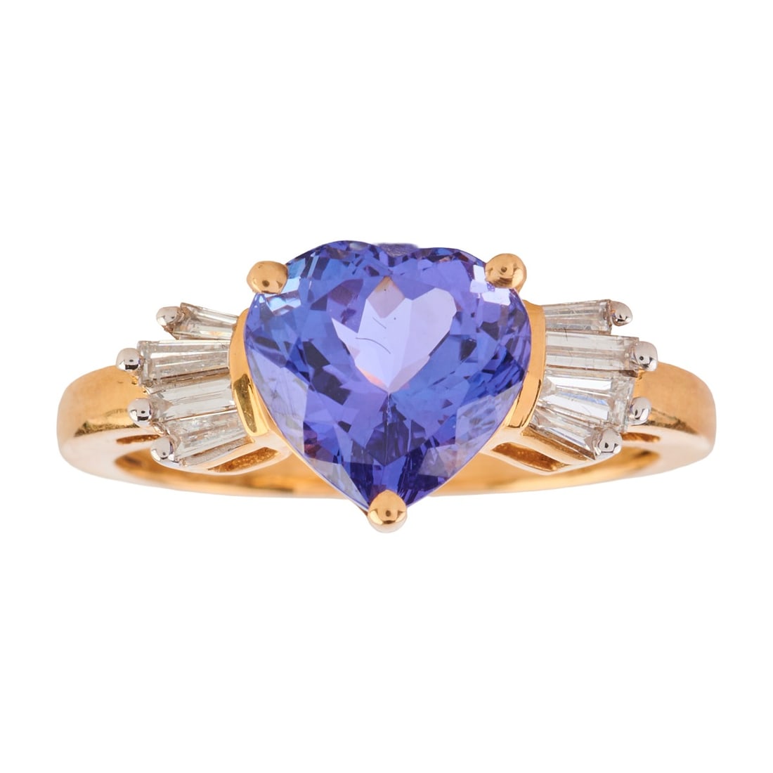 Tanzanite, Diamond, 14k Yellow Gold Ring: Tanzanite, Diamond, 14k Yellow Gold Ring. Featuring one heart-cut tanzanite weighing approximately 2.60 cts., accented by eight tapered baguette-cut diamonds weighing a total of approximately 0.15