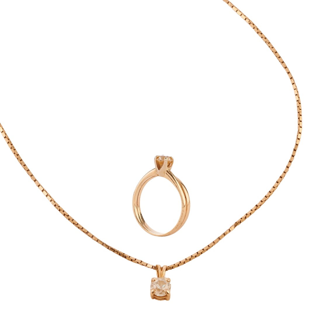 Diamond, 14k Yellow Gold Jewelry Suite: Diamond, 14k Yellow Gold Jewelry Suite. Including one diamond, 14k yellow gold 18 inch necklace together with a diamond, 14k yellow gold solitaire ring, size 6 1/4. {Gross Weight: 3.8 dwts}