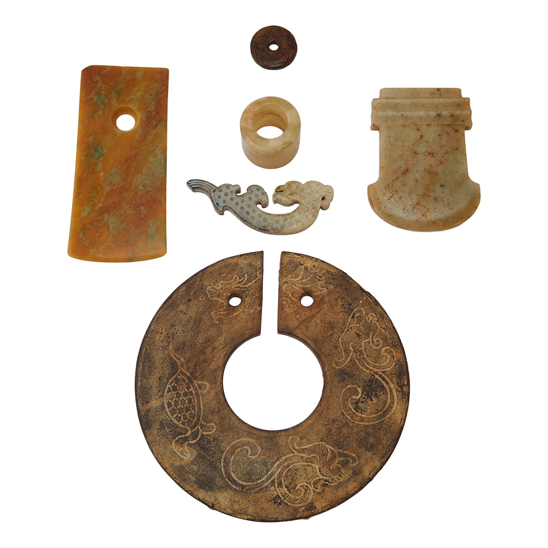 A Group of Jade and Stone Items: A Group of jade and stone items.;{Largest: diameter;6 1/8 inches; Smallest: diameter 1 1/4 inches}.;Provenance: From the collection of the distinguished San Francisco collector Irving Freedenberg, kno