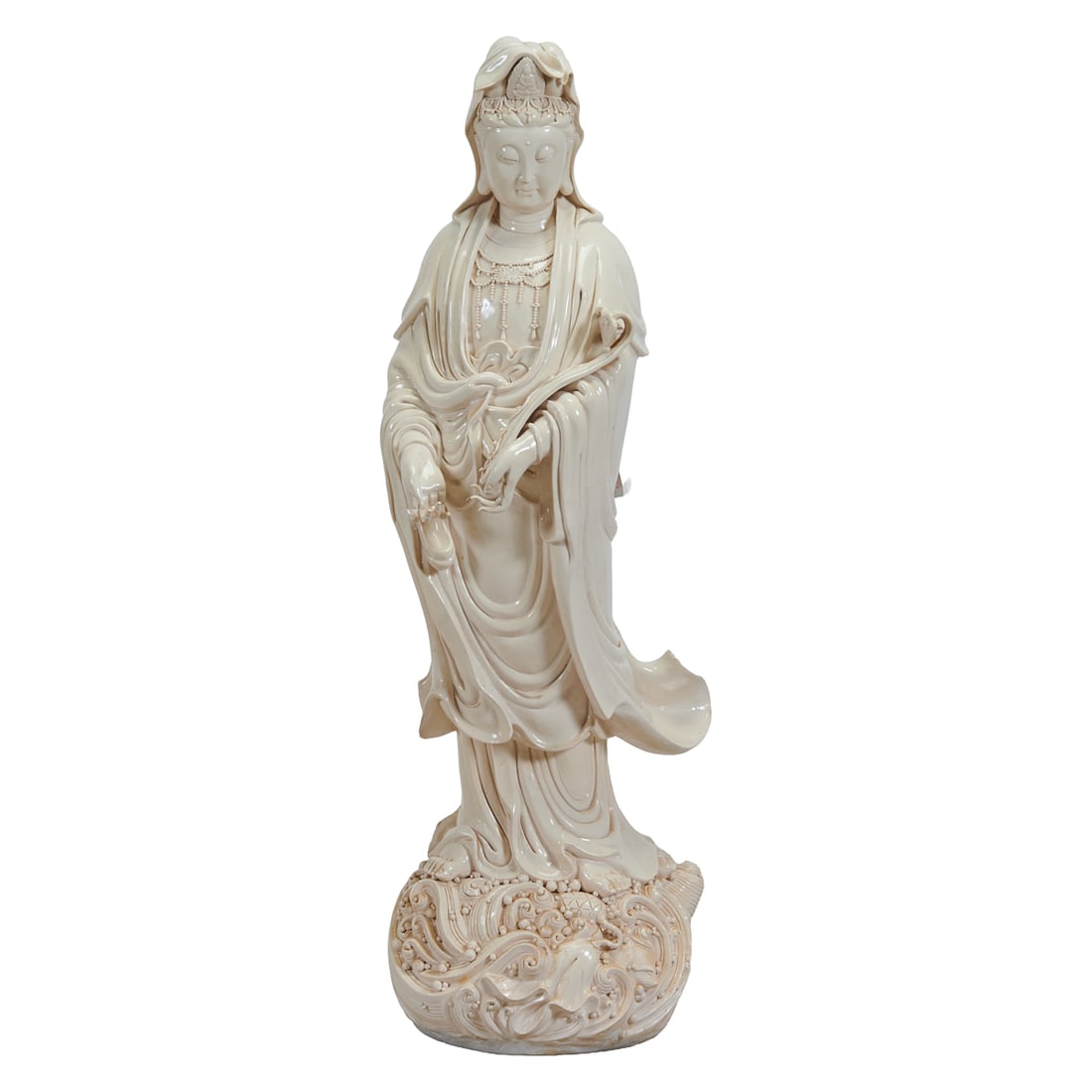 Large Porcelain Guanyin, Late Qing Dynasty: Large Porcelain Guanyin . {Height 46 1/2 inches}.This lot comes from the family collection of Ms. Julia Tsui. Michaan's Auctions is honored to present these works with Ms. Tsui's generous support.Her 