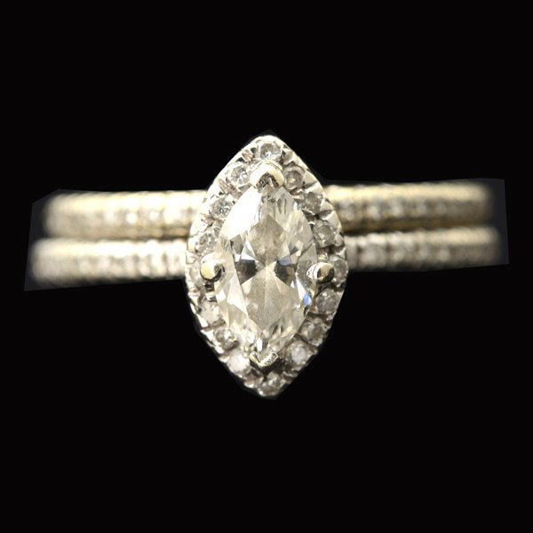 DIAMOND, 14K WHITE GOLD WEDDING RING SET.: DIAMOND, 14K WHITE GOLD WEDDING RING SET. Including one marquise-cut diamond weighing approximately 0.75 ct., surrounded by fifty-four full-cut diamonds weighing a total of approximately 0.15 cttw., s