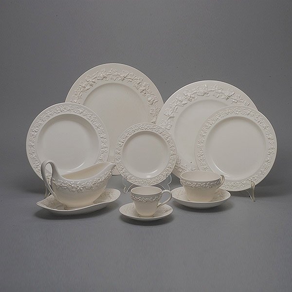 Wedgwood Queensware Dinner Service:: Wedgwood Queensware Dinner Service: Comprising eleven dinner plates {diameter 11 1/2 inches}; thirty five luncheon plates {diameter 10 1/2 inches}; one soup bowl; twenty six salad plates {diameter 8 1