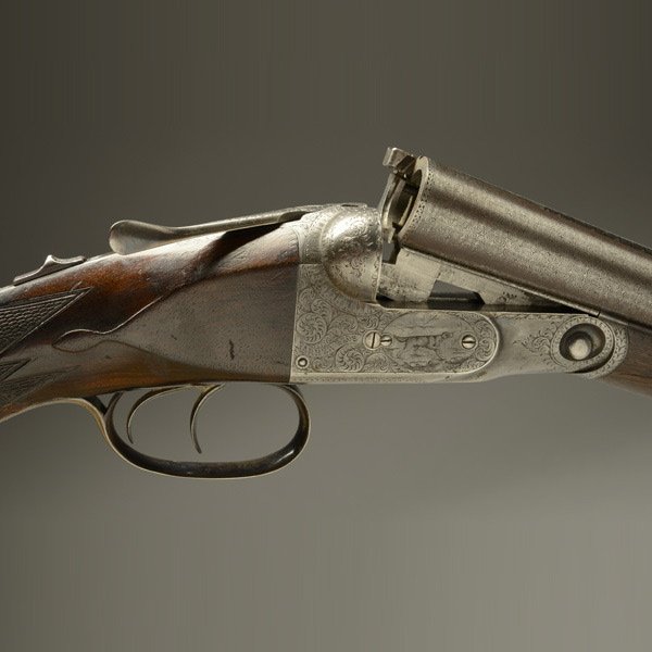 Parker Brothers DH Grade Hammerless Shotgun: Parker Brothers 16 gauge DH Grade Side by Side Hammerless Shotgun 23-inch barrel, SN 79472, manufactured in 1893, damascus barrels, double triggers, boxlock engraved with dog and bird scenes, skeleton