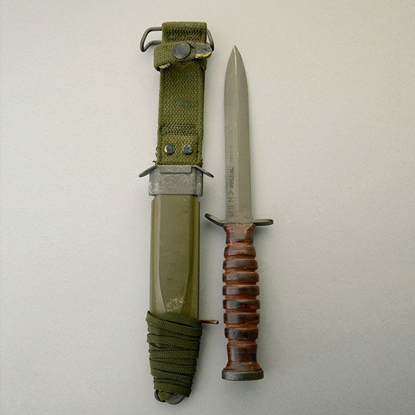 U.S. M3 Trench Knife of World War II vintage: U.S. M3 Trench Knife of World War II vintage marked on the blade US M3 Imperial, in fine original condition showing some handle wear with US M8A1 scabbard