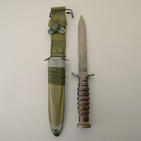 U.S. M3 Trench Knife of World War II vintage: U.S. M3 Trench knife of World War II vintage marked on the blade US M3 Imperial, in fine original condition showing some handle wear with US M8A1 scabbard