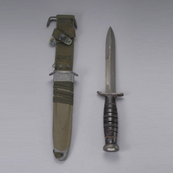 U.S. M3 Trench Knife of World War II: U.S. M3 Trench Knife of World War II vintage, marked on the guard US M3 Imperial in fine original condition with US M8A1 scabbard.