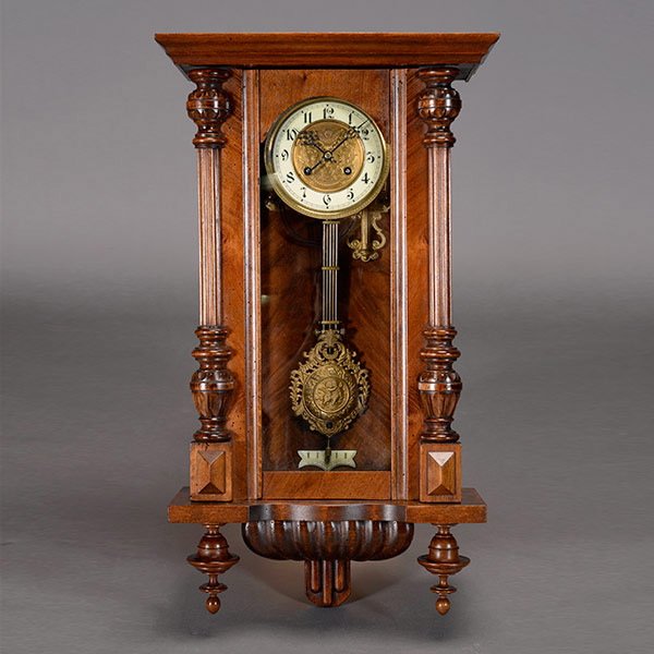 German Walnut Regulator Wall Clock: German Walnut Regulator Wall Clock, signed {Dimensions 27 x 15 x 6 1/2 inches} [with pendulum and key]