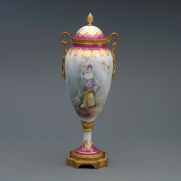 Sevres Style Gilt Bronze Porcelain Mounted Urn: Sevres Style Gilt Bronze Porcelain Mounted Urn, finely painted with a figure of Flora with a cherub in a plein air garden, the reverse with a romantic landscape with a spring landscape, signed "Fajot"