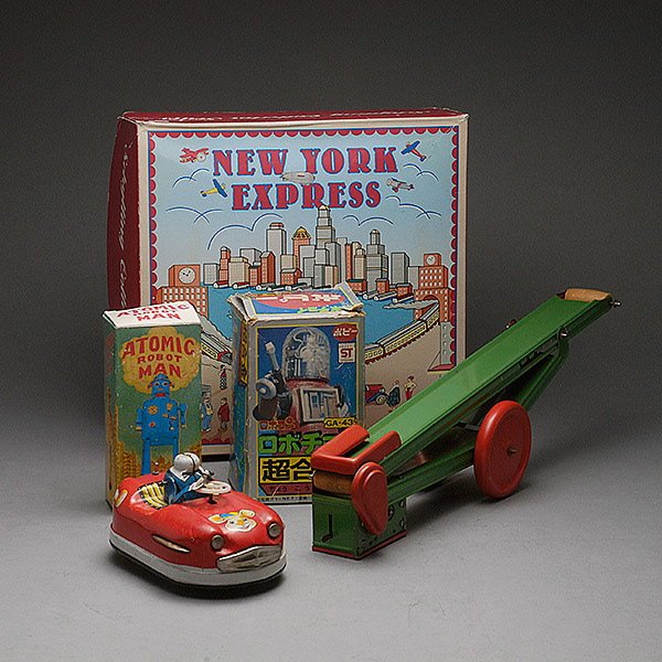 Group of Five Vintage Toys:: Group of Five Vintage Toys: Including two robots with boxes, one Japanese and one Atomic Robot Man {taller 5 1/2 inches}; KO Japanese Bouncing Racer {lacking head}; Schyling Express Train, with box; a